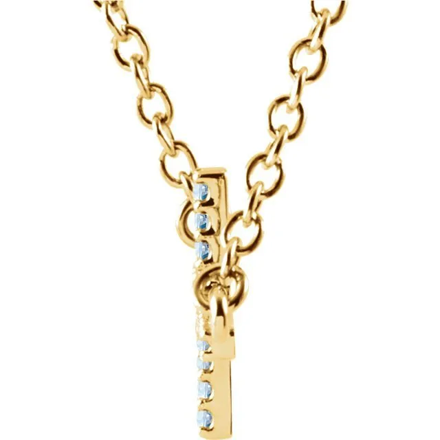 14KT GOLD 0.17 CTW ROUND AQUAMARINE SIDEWAYS CROSS NECKLACE