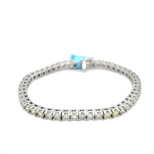 7.02 CTTW NATURAL DIAMOND TENNIS BRACELET SET IN 14 KARAT WHITE GOLD AT REGARD JEWELRY IN AUSTIN,